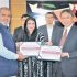 China Road and Bridge Corporation hands over building of Chinese camp at Hazara Motorway to AUST