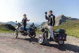 Pair cross Italy by motorcycle to raise awareness about immigration